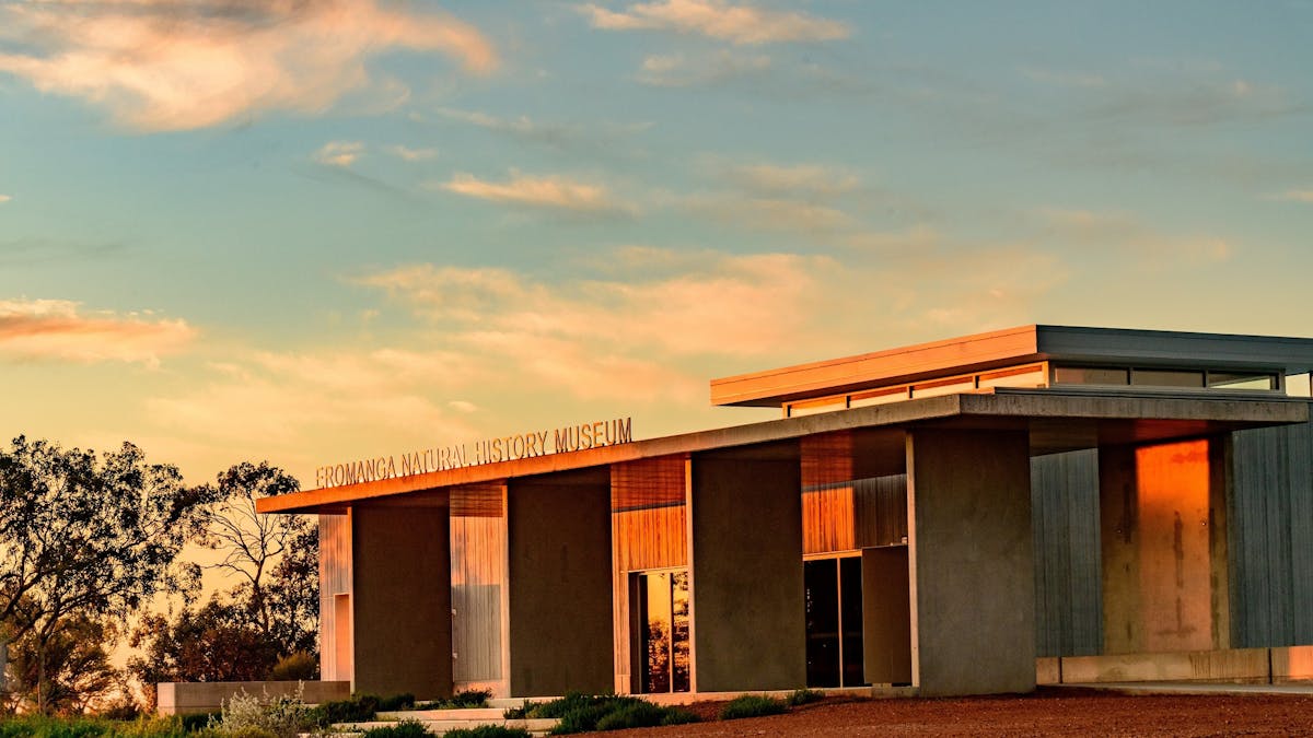 sunset photo of the front of the Eromanga Natural History Museum