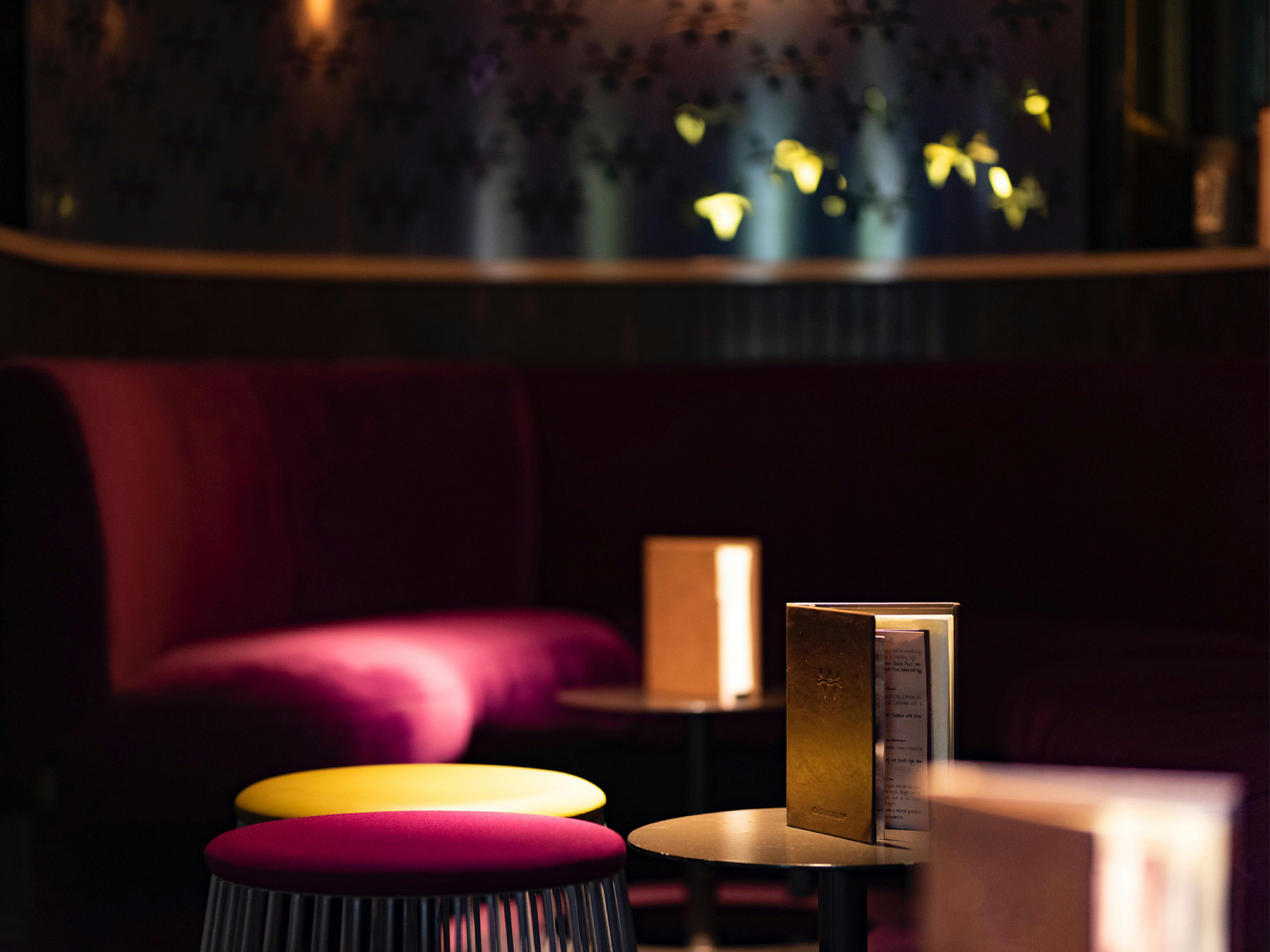 Lounge area with bar menu and booths