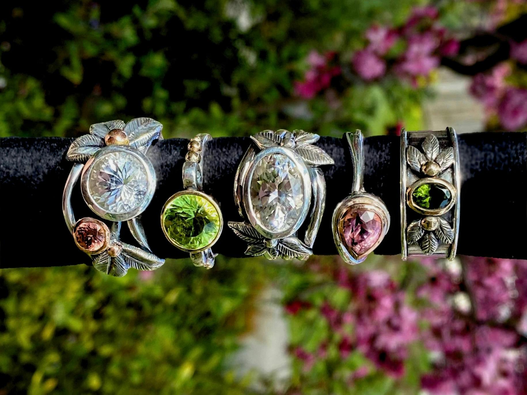 Rings in jewel tones with spring flowers