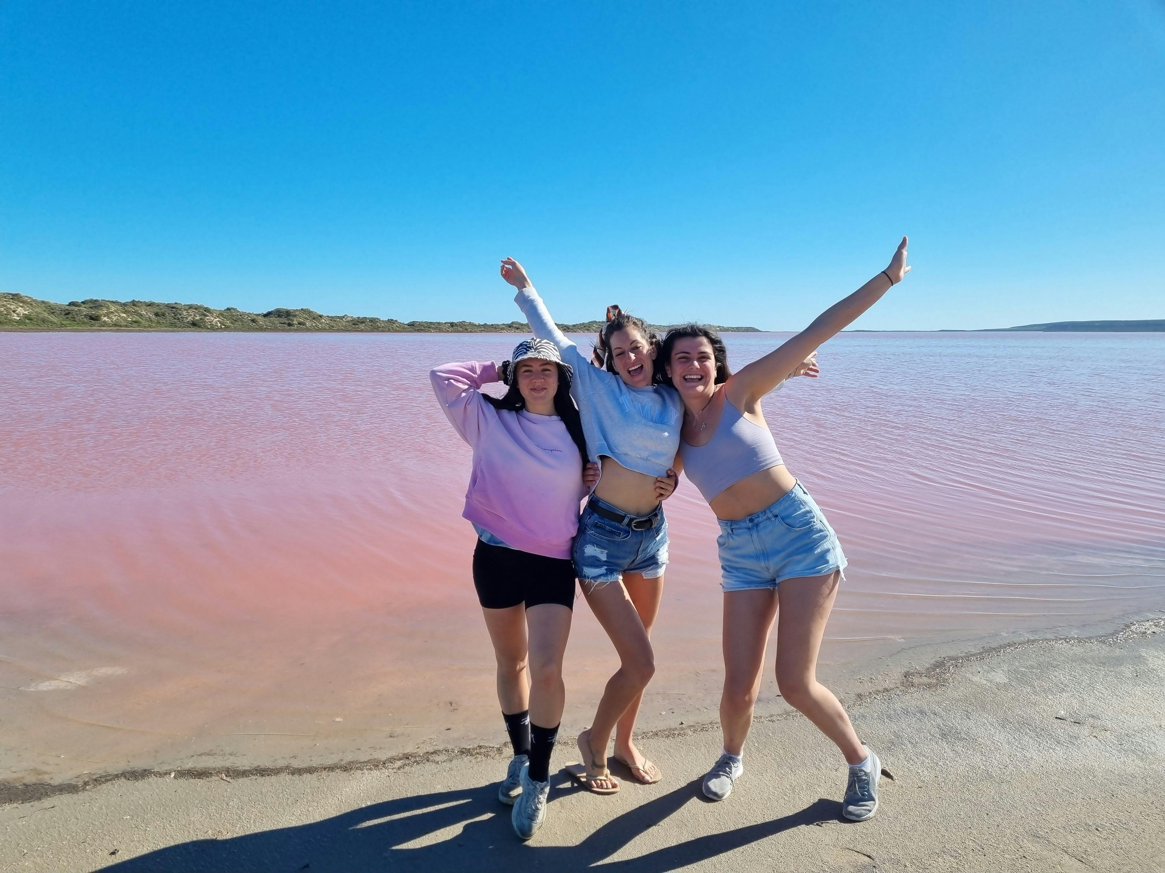 3 girls posing in front of the Pink Lake