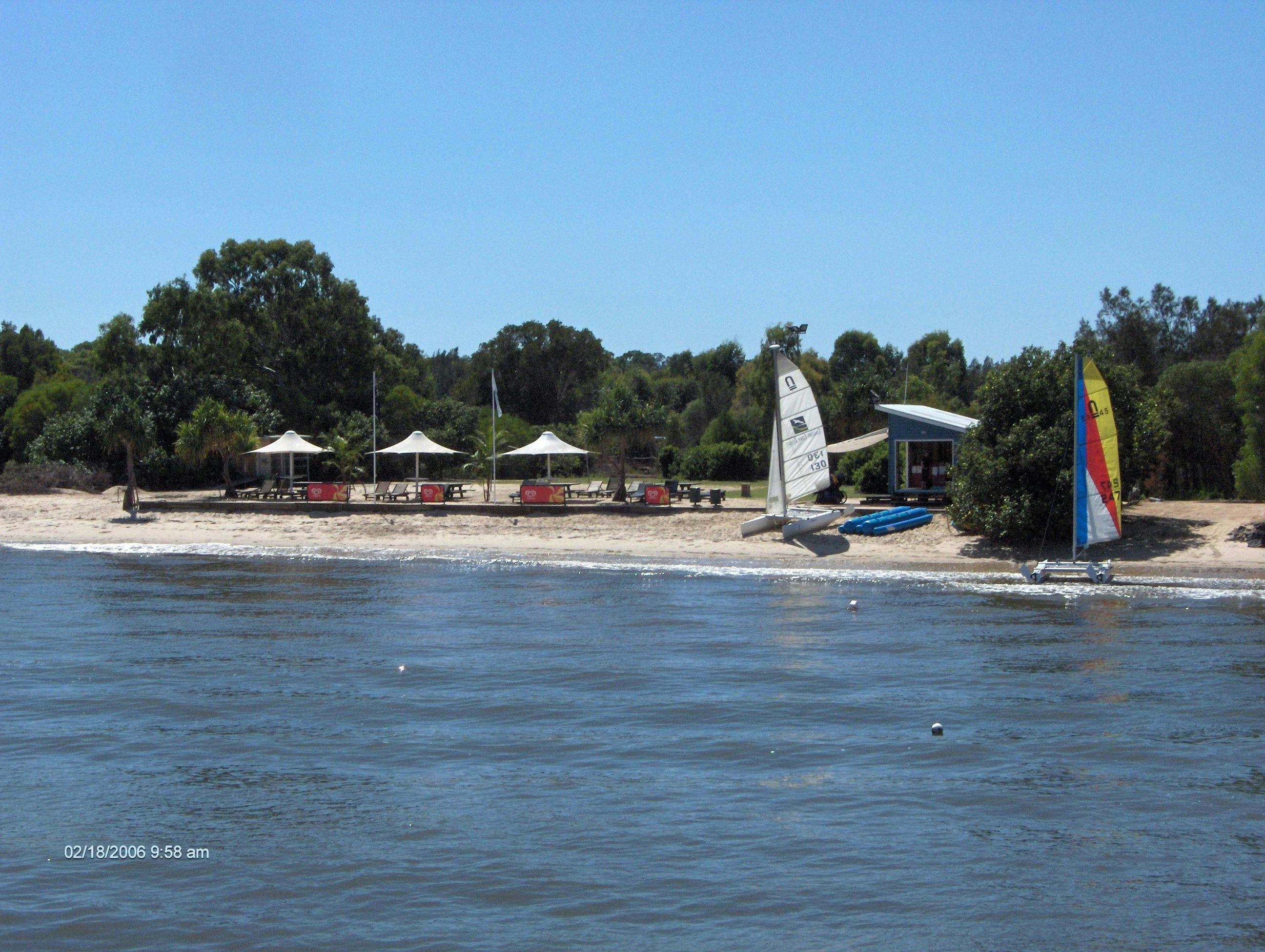 Lady Brisbane cruising past one of 300 Whitsunday style islands, to Southport