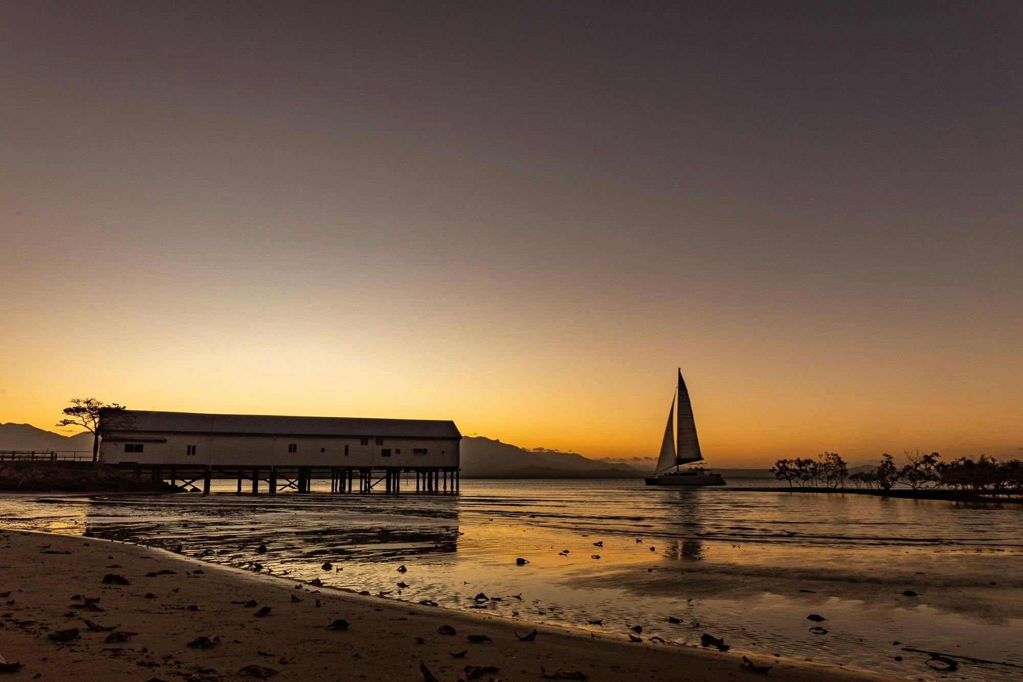 The sun setting behind the Sugar Wharf