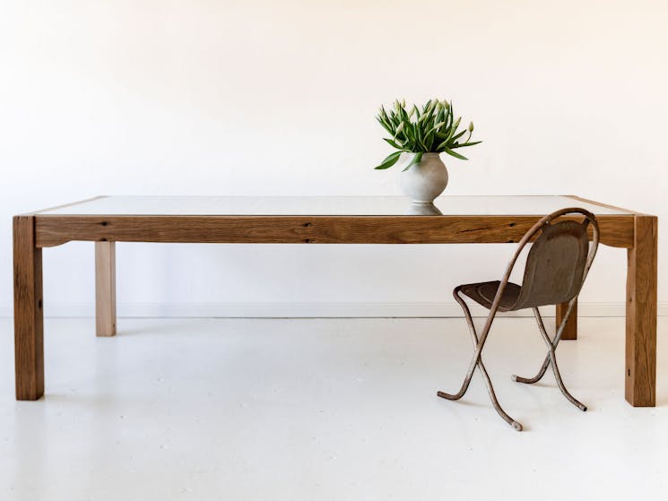 A replica wool classing table made from recycled slats from the flooring of a local wool shed.