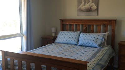 Also has a desk, couch and walk-in robe