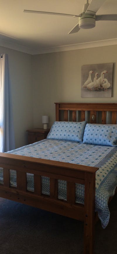 Also has a desk, couch and walk-in robe