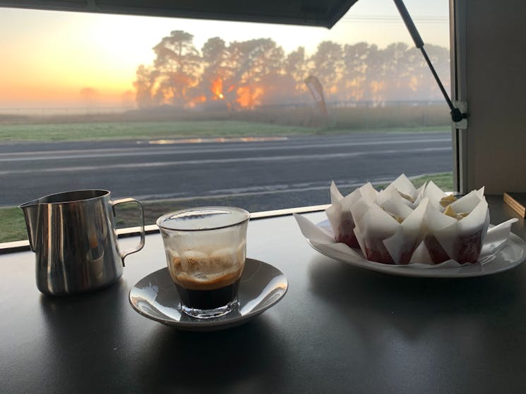 Sunrise at the Whistlestop Coffee Van showing coffee & muffins