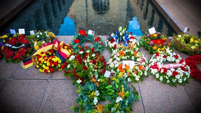 Wreaths laid at the base of the Pool of Reflection at the Australian War Memorial