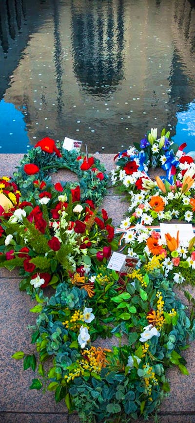 Wreaths laid at the base of the Pool of Reflection at the Australian War Memorial