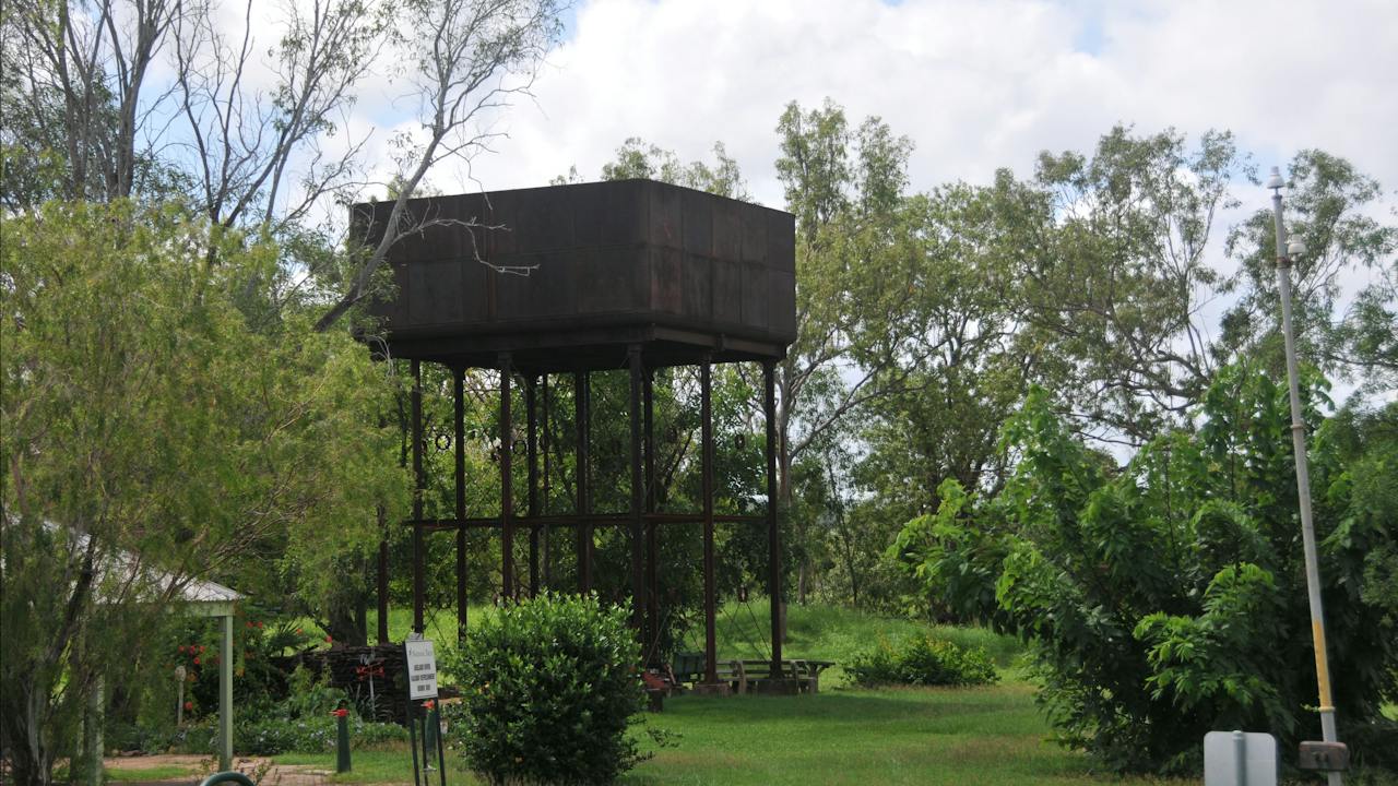 Overhead water tank behind the station.