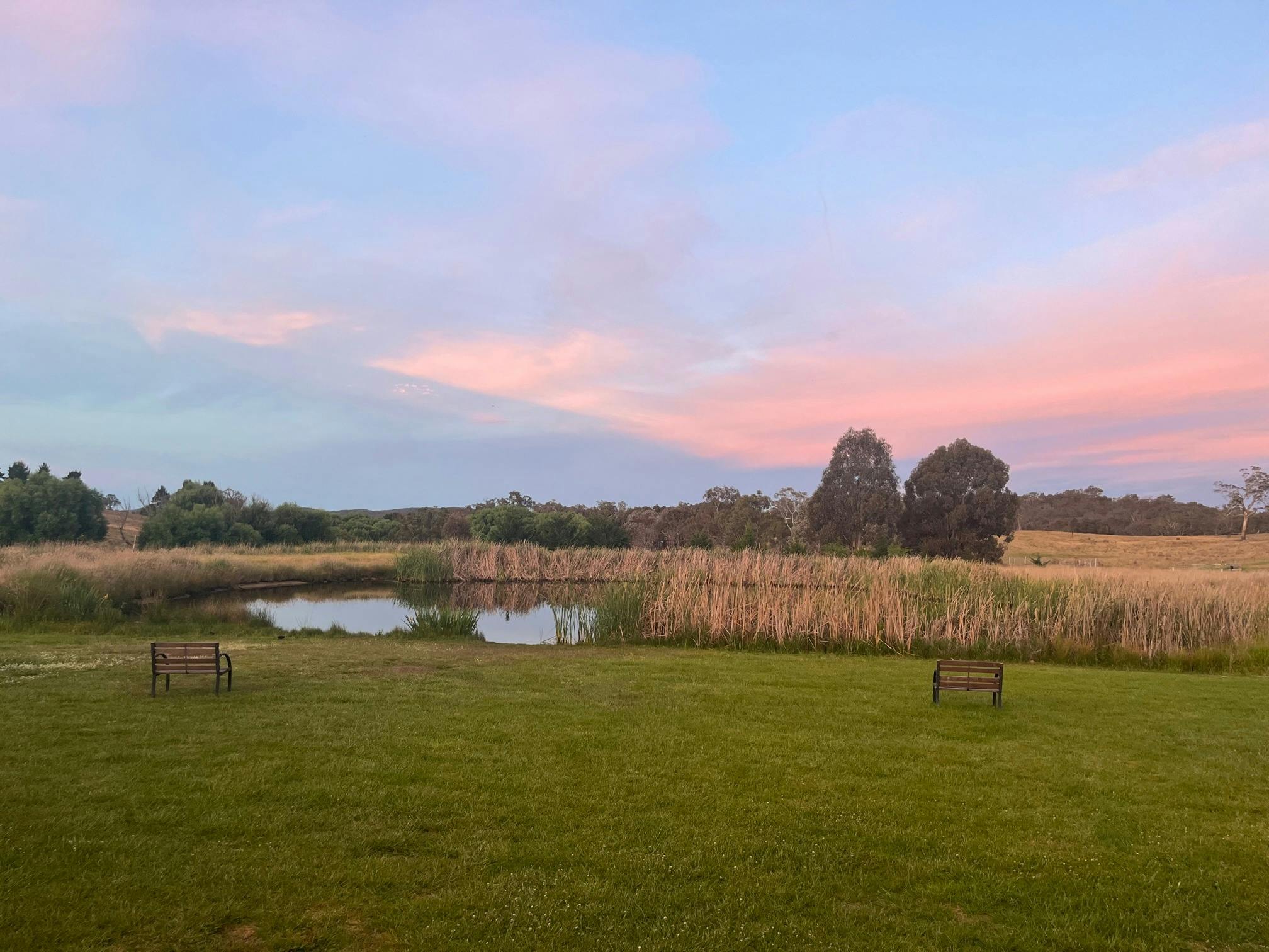 A dam with a sunset background
