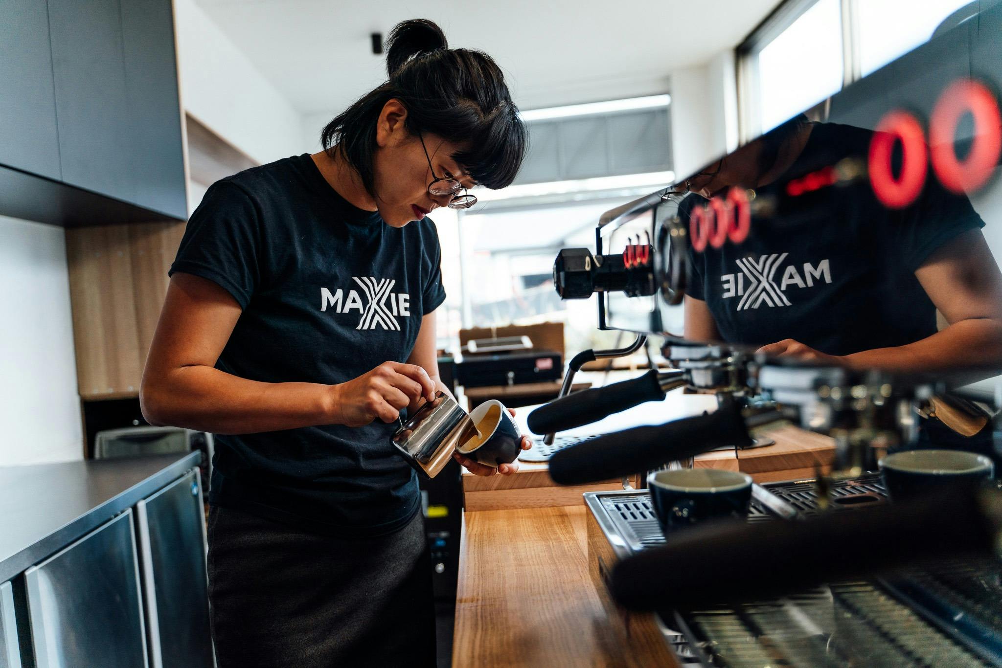 Barista is making coffee