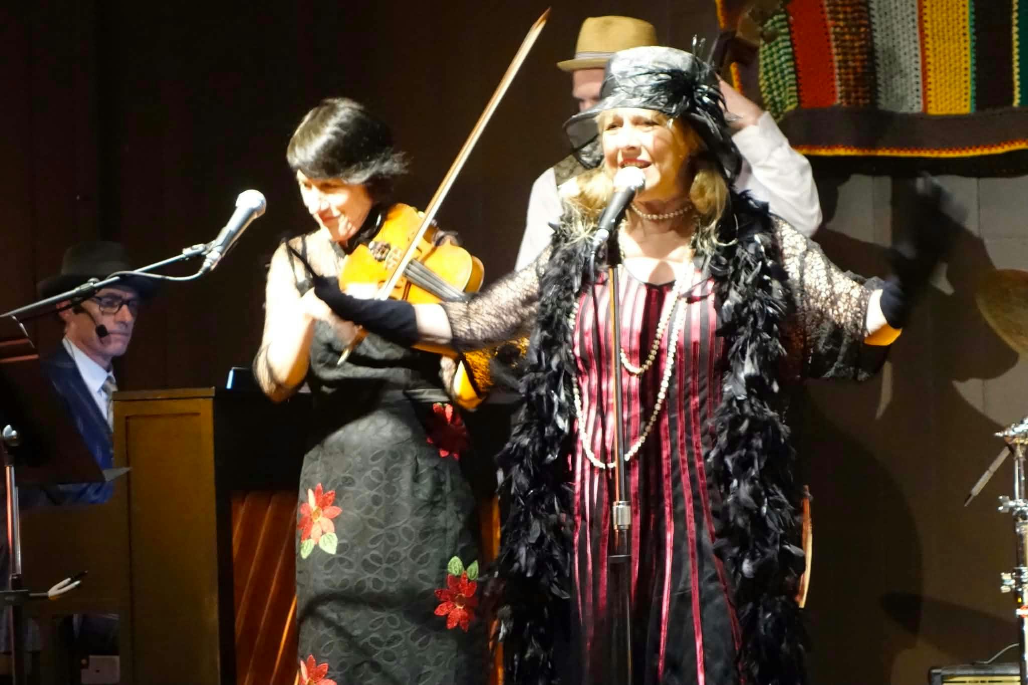 Main singer and violinist in action