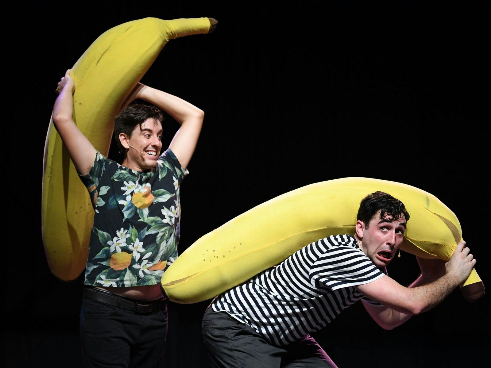 2 men with giant bananas