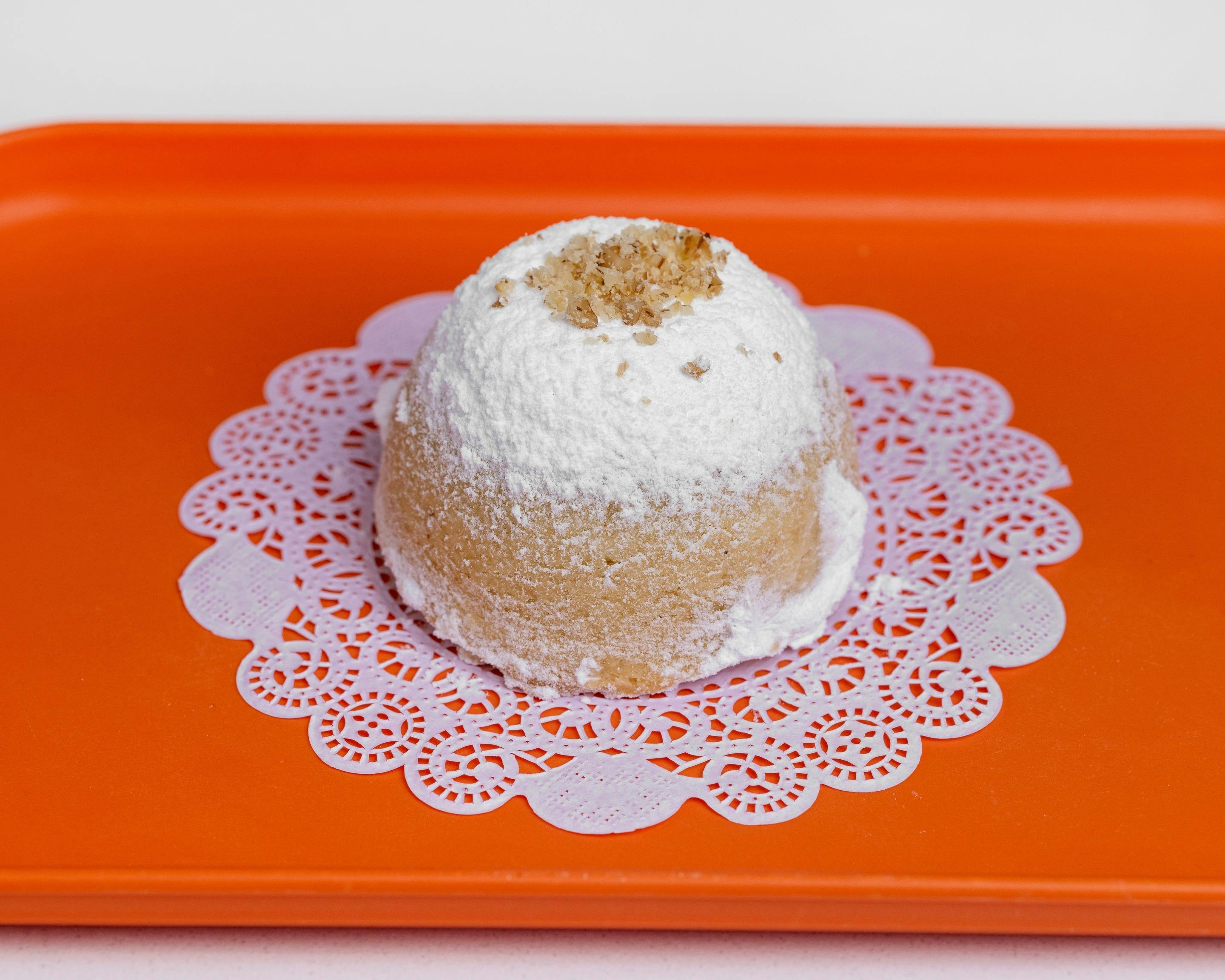 Smeed Walnut cake on orange tray