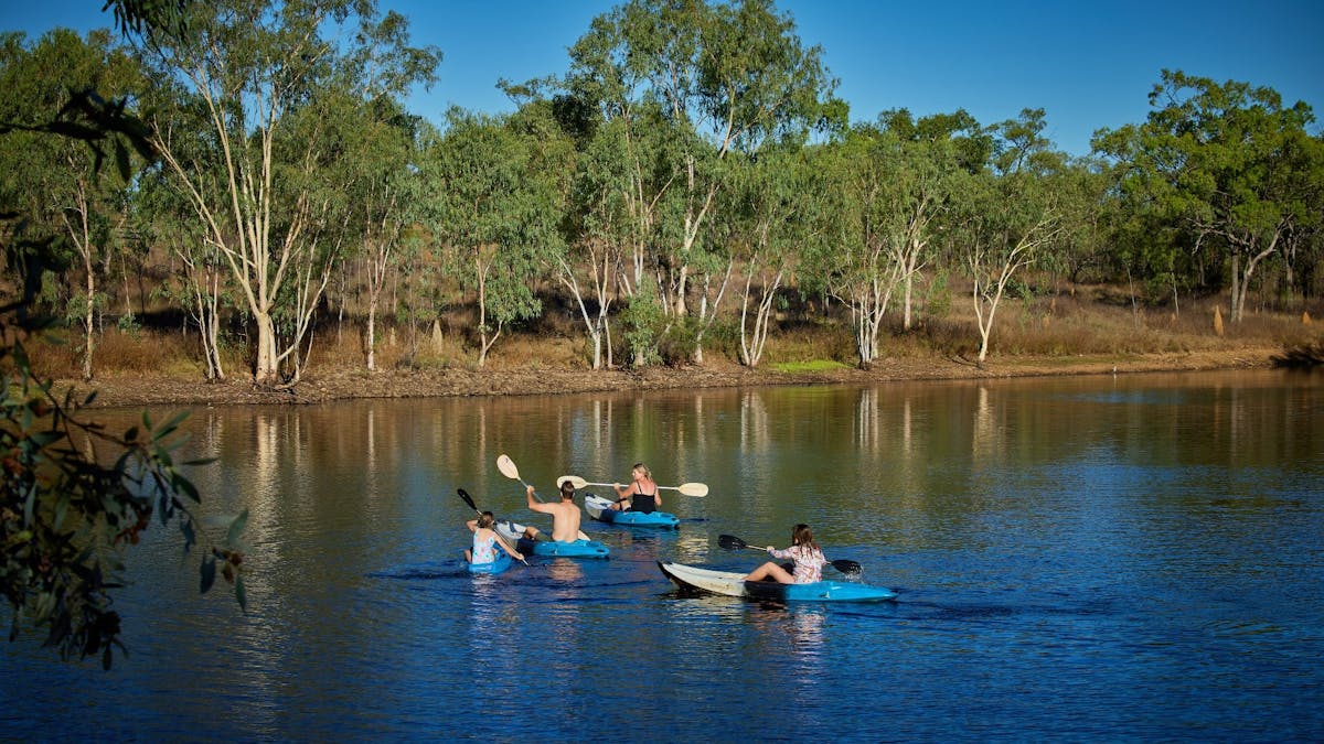 Family kayaking on dam - Cobbold Village