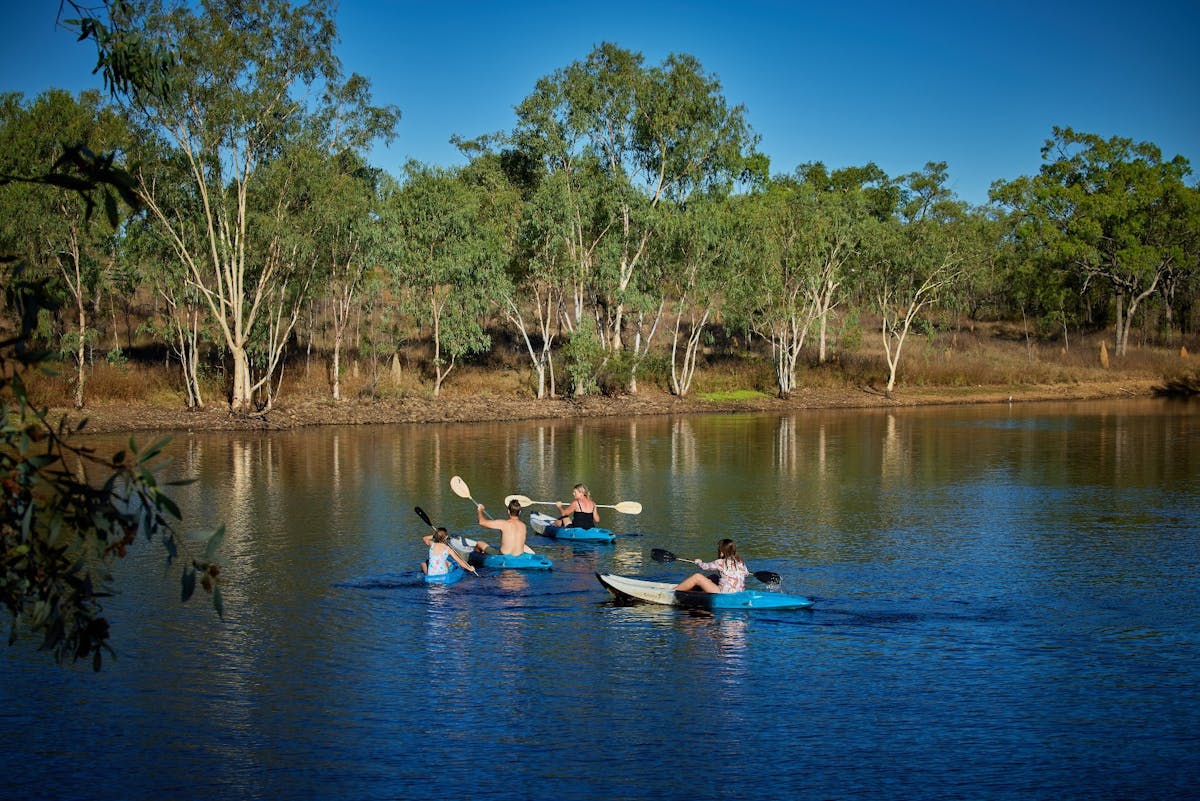 Family kayaking on dam - Cobbold Village