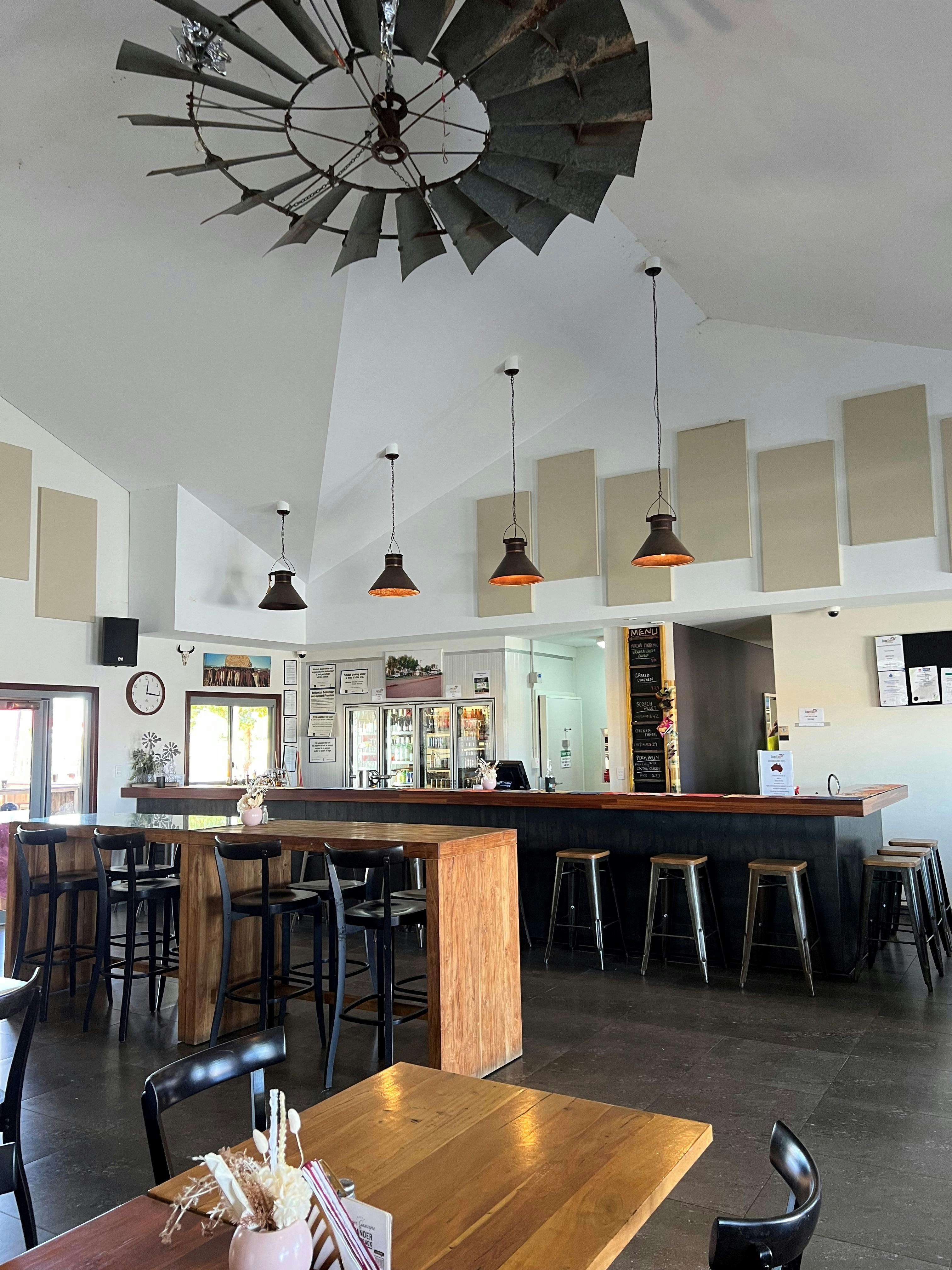 Inside the Gascoyne Junction Pub and Tourist Park showing seating area and the bar.