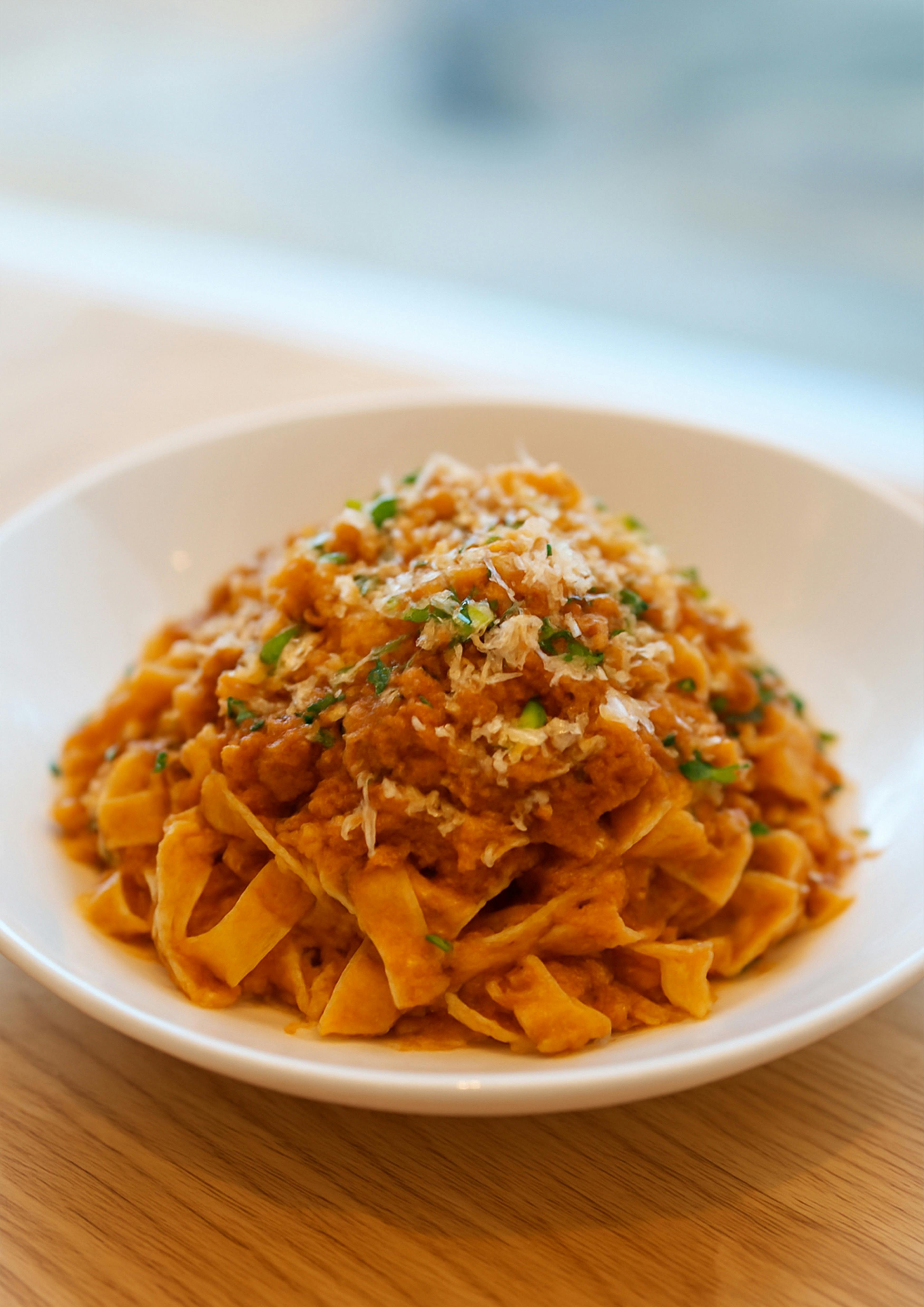Tagliatelle pasta with Bolognese sauce and parmesan at Esteria