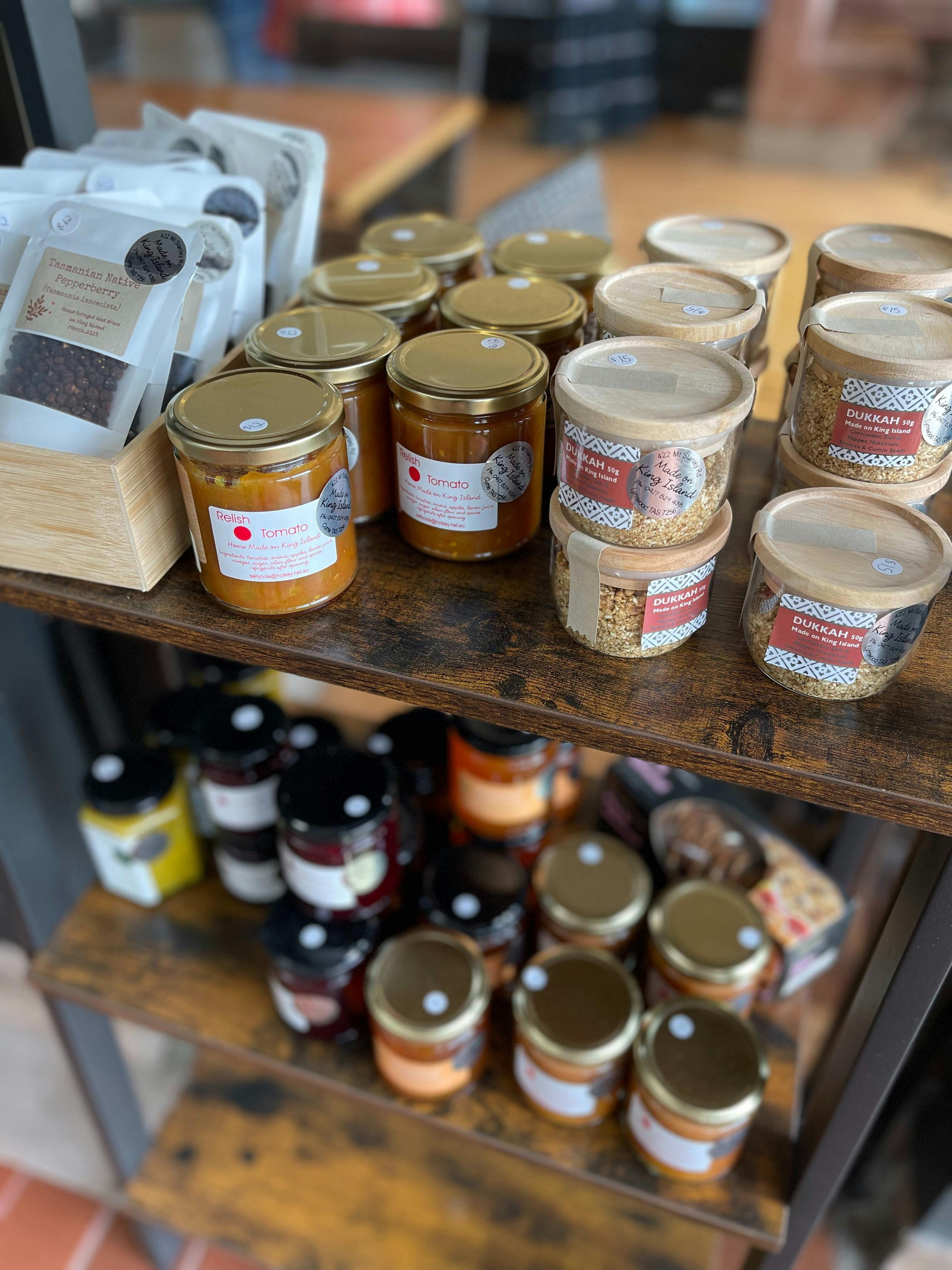 An array of local condiments including dukkah, relish, chutneys and jams