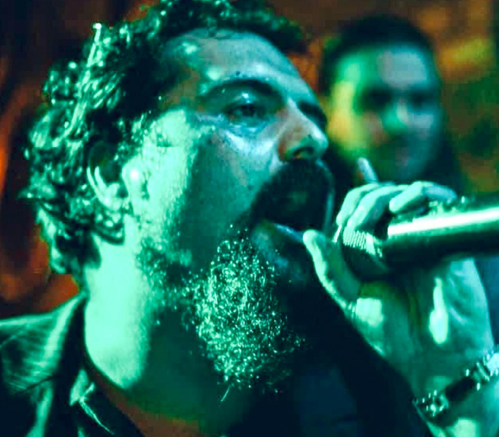 A karaoke singer holding a microphone