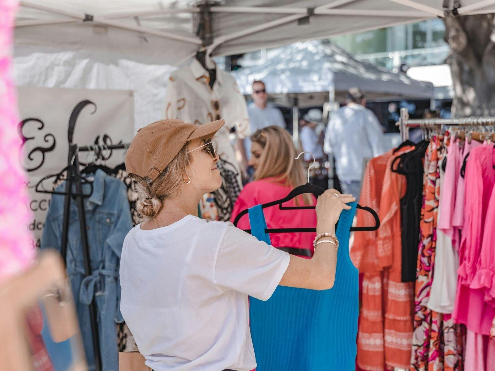 Browsing colourful fashion and local style at Terrigal Beach Markets