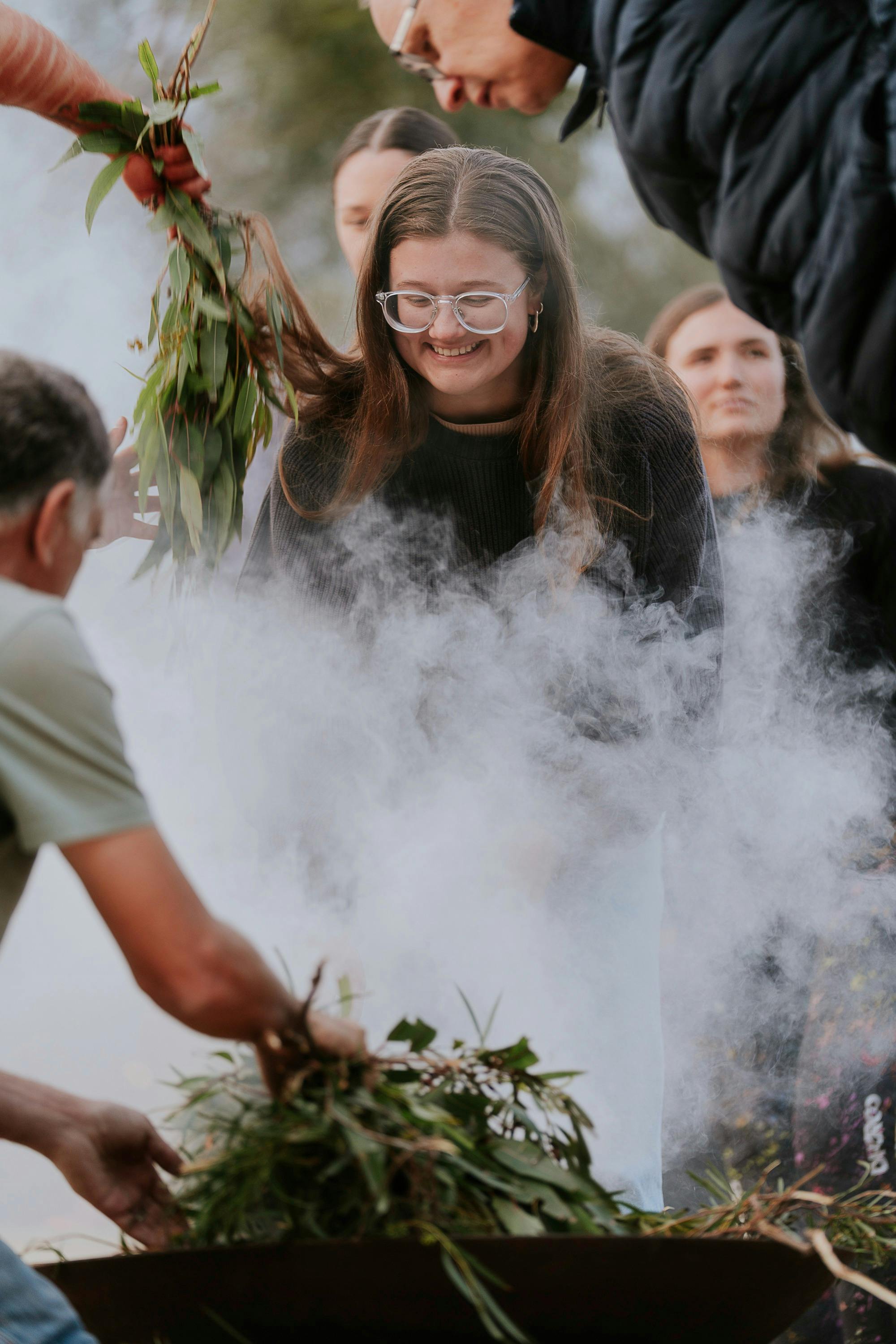 A female runner takes in the smoke