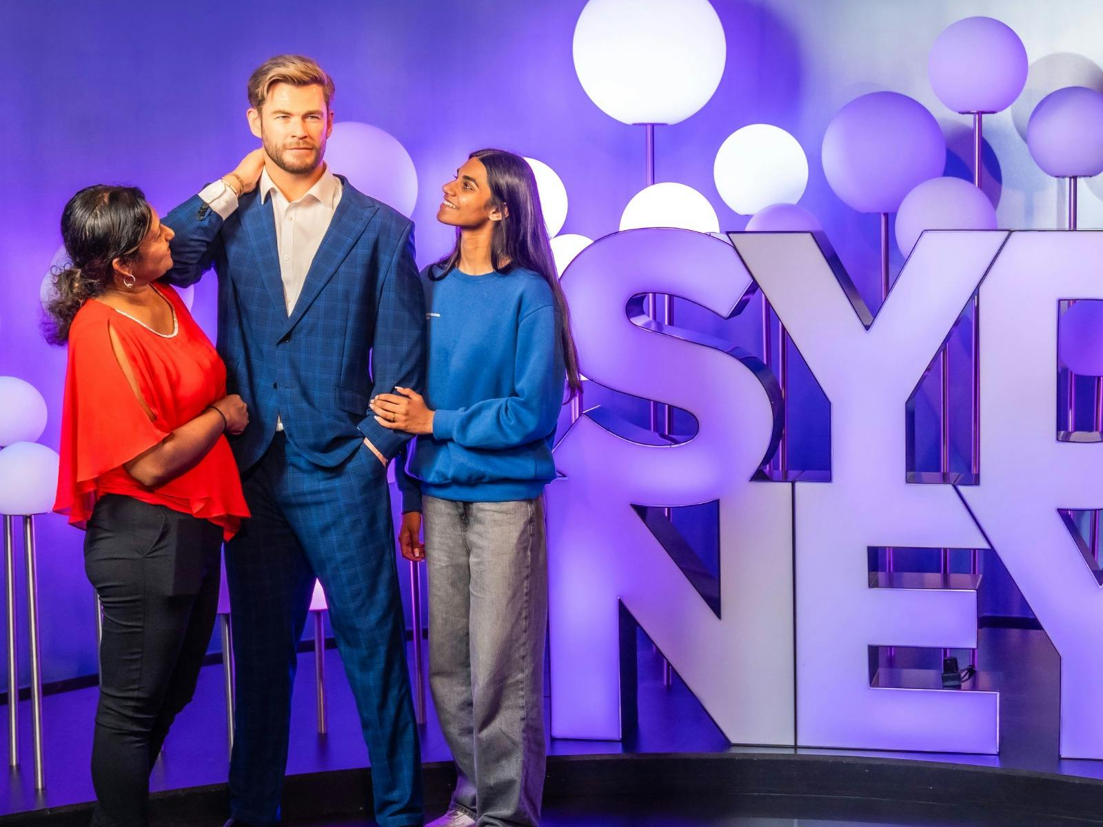 Mum and daughter getting up close to Chris Hemsworth at Madame Tussauds Sydney