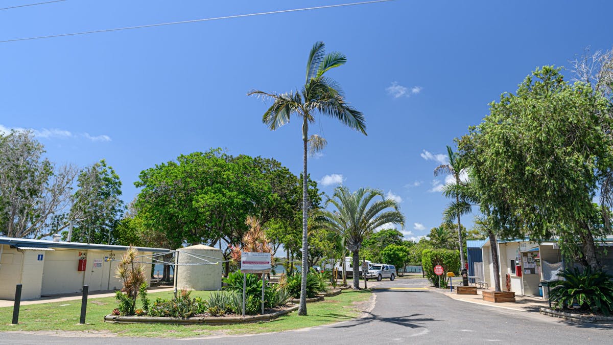 Entrance to Miara Holiday park with the office on the right and amenities on the left.