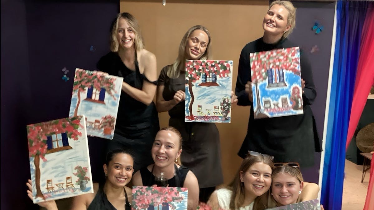 Ladies proudley displaying their finished masterpeices.