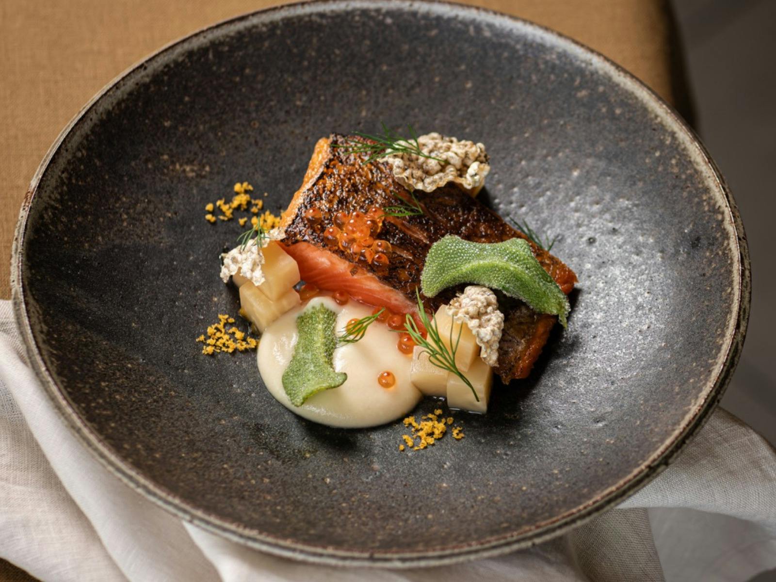 Lunch with a View: Indulge in gourmet dining at a hatted restaurant in the heart of wine country