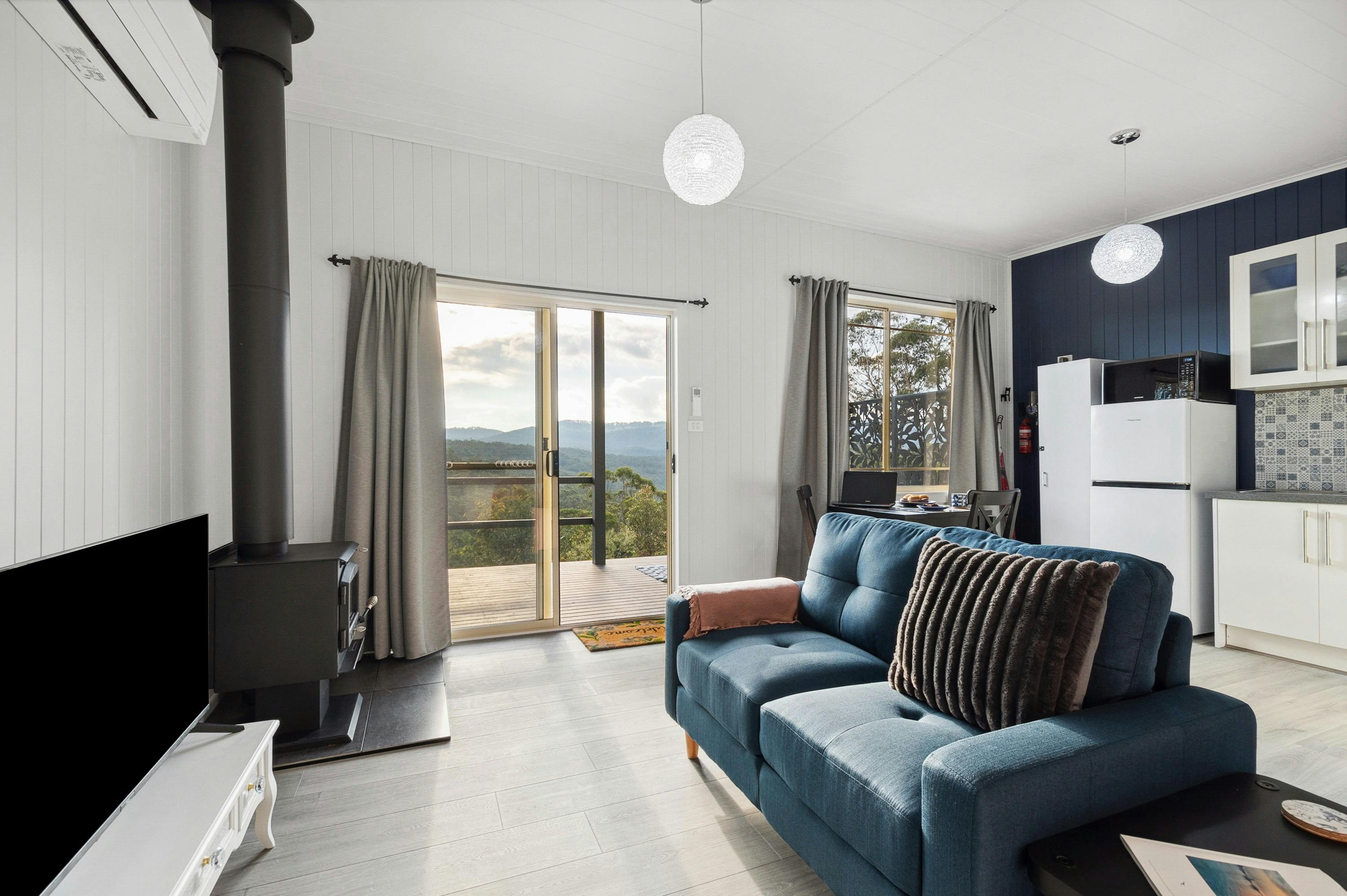 Lounge area with Smart TV and combustion fire