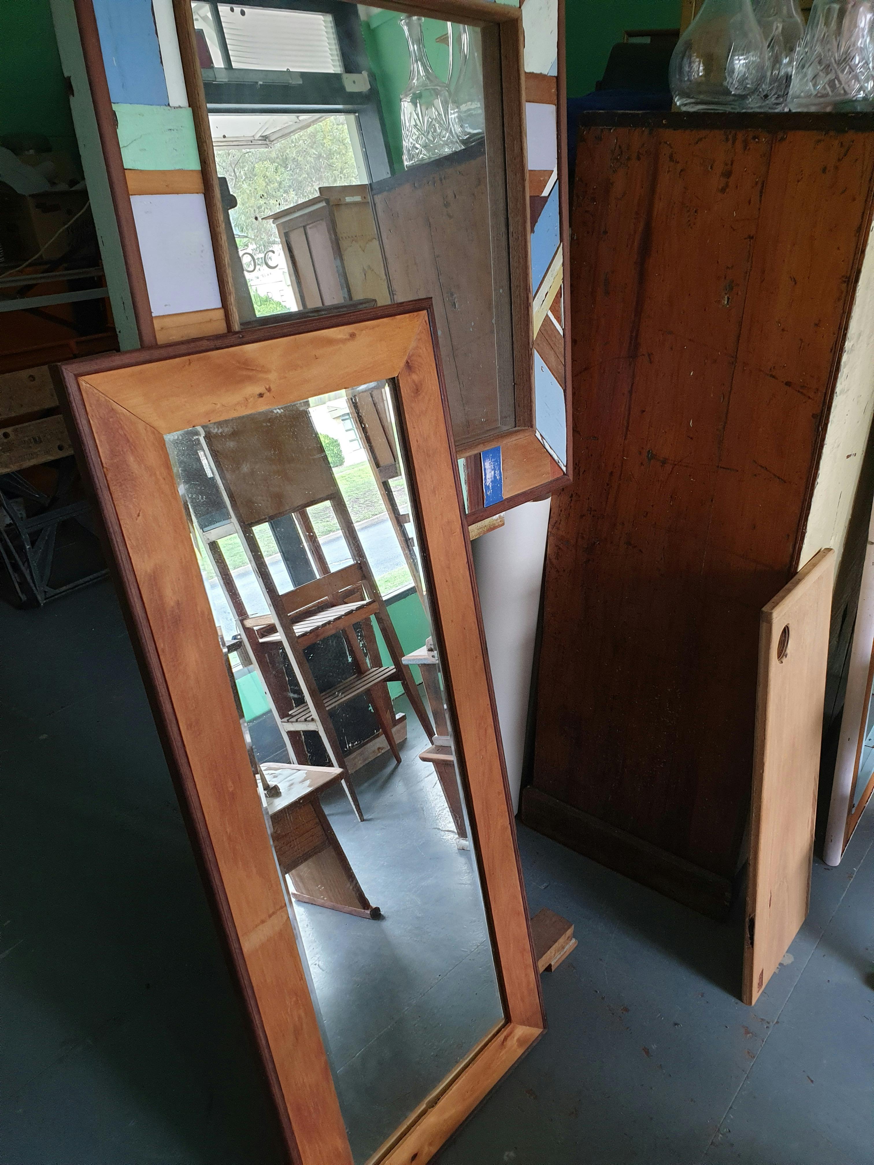 Large mirror with a recycled timber frame