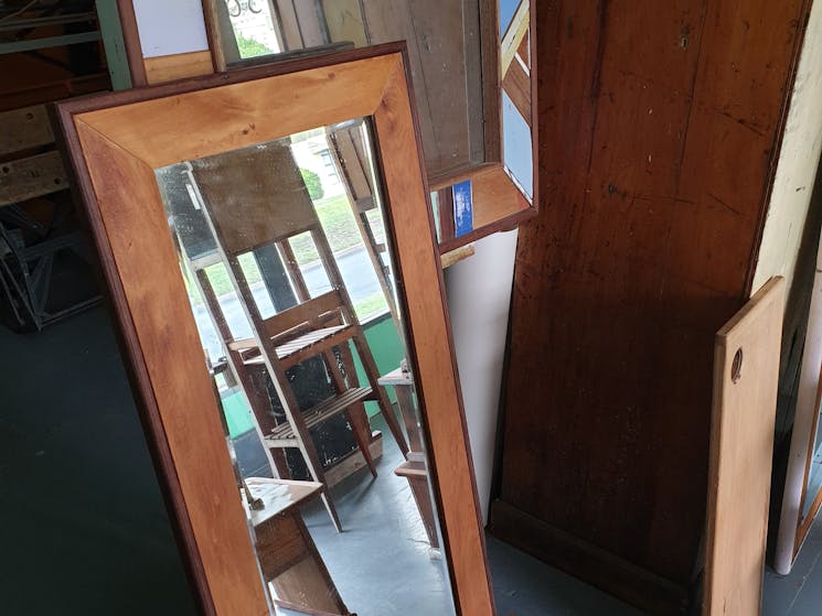 Large mirror with a recycled timber frame