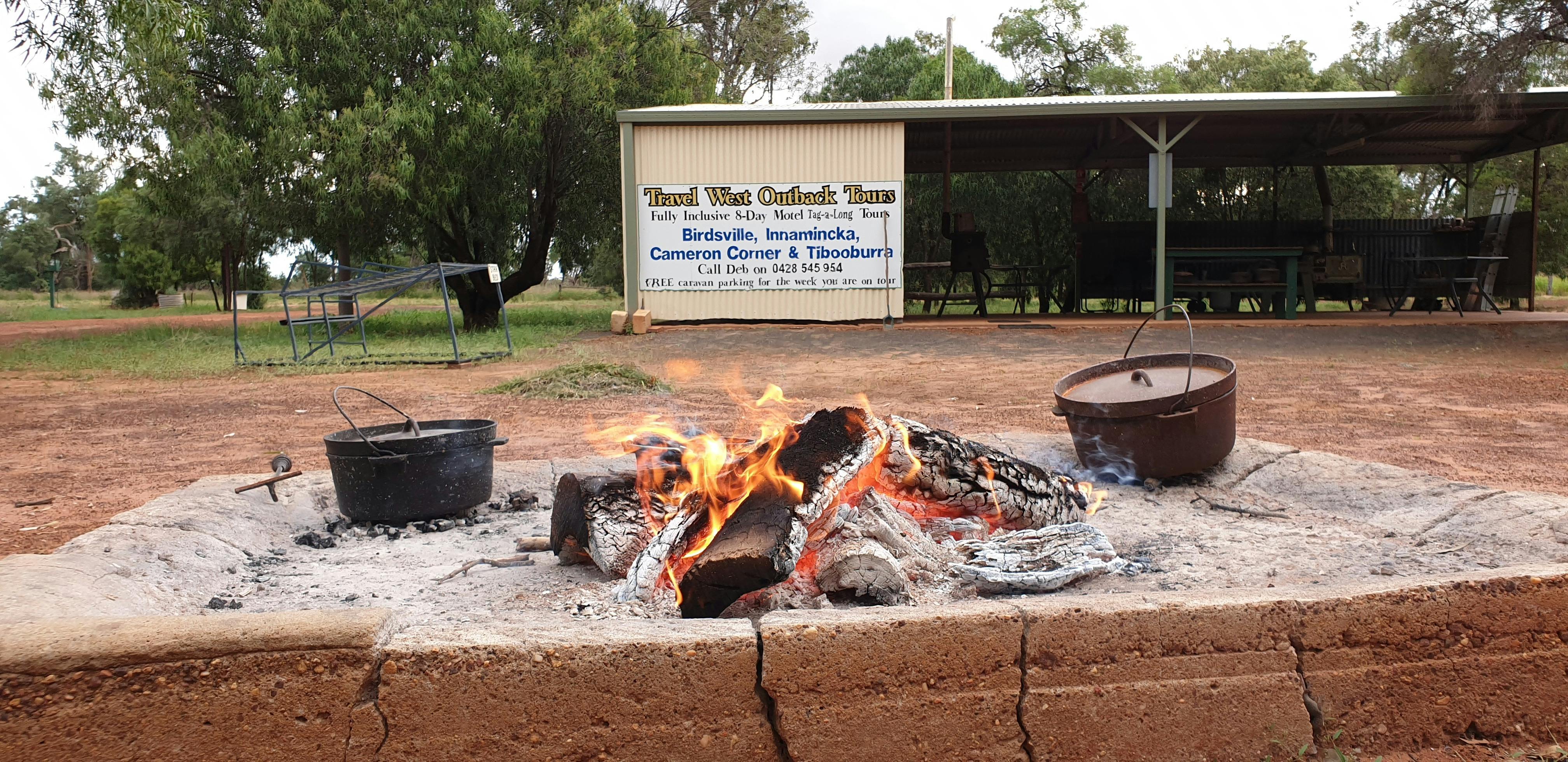 Camp ovens on the fire