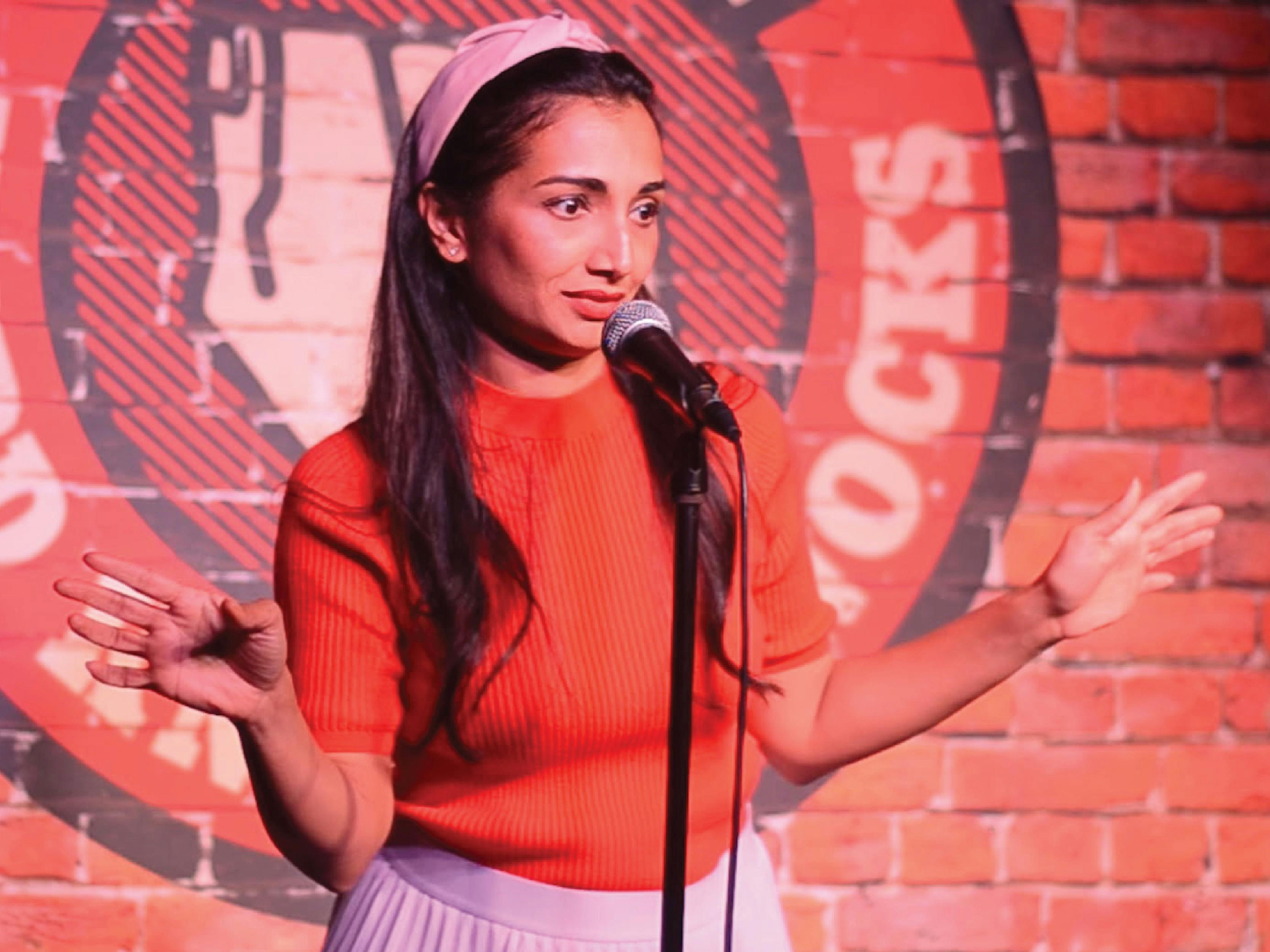Student performing stand-up comedey