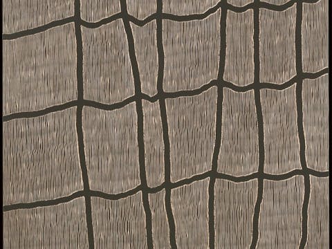 A wood relief carving with black background and taupe lines