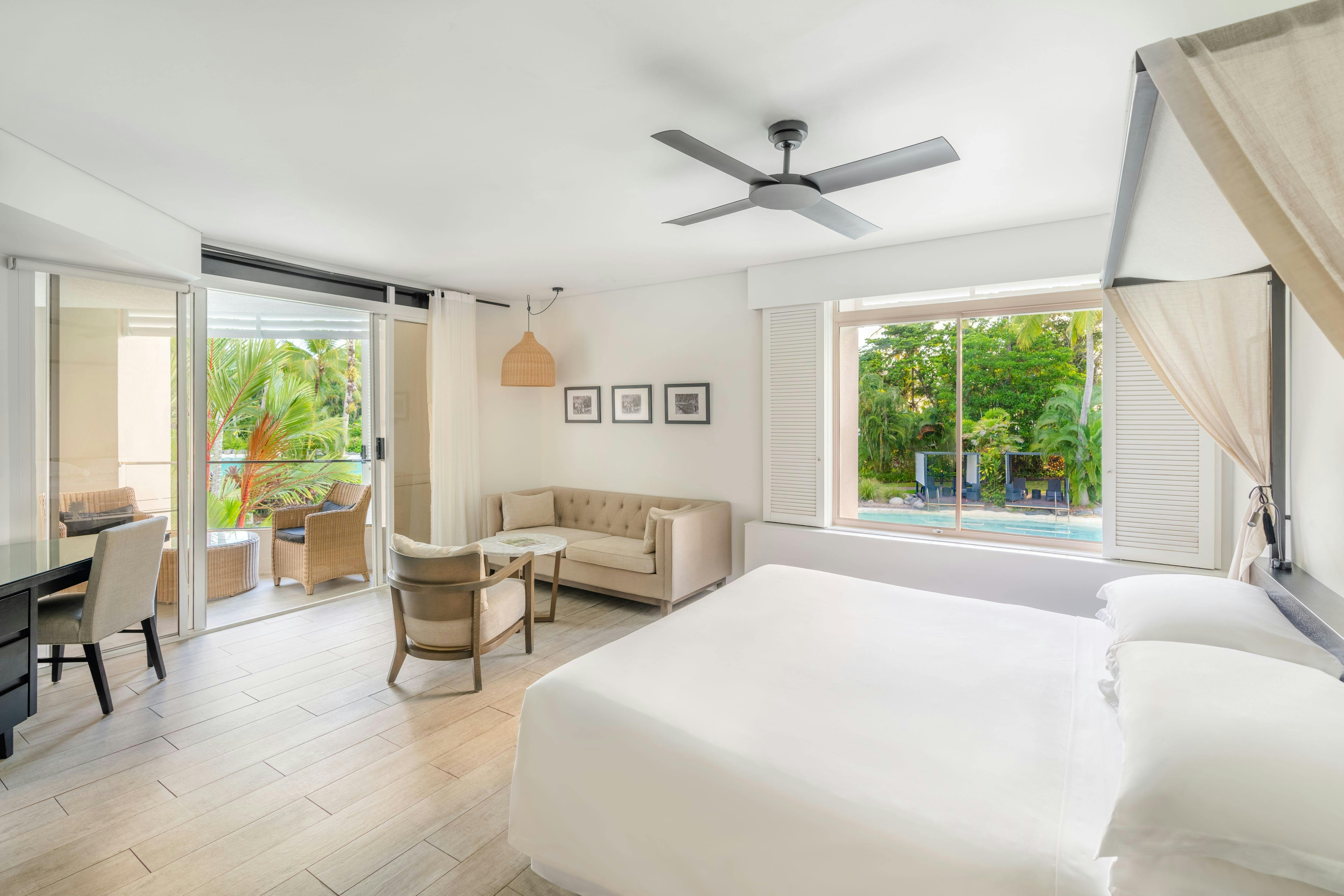 King bed overlooking lagoon pool