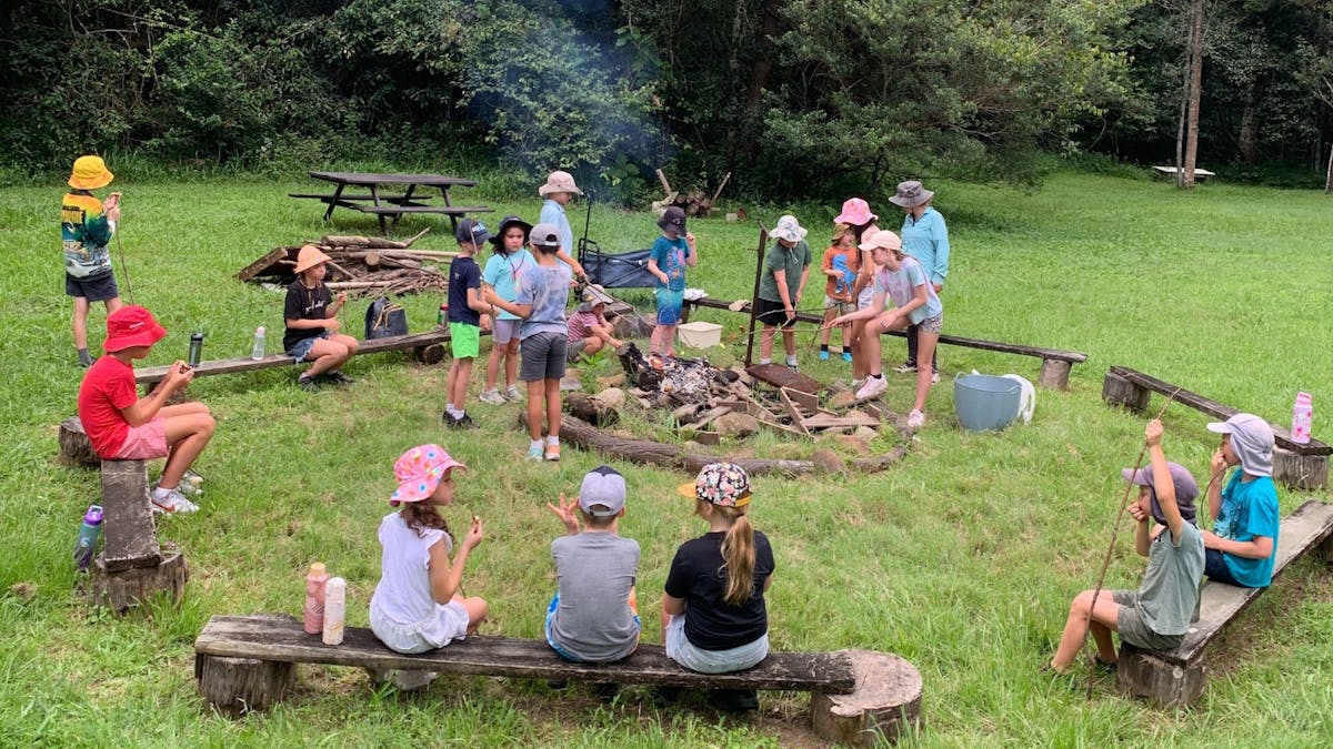 Children cooking on campfire at Birdwings Forest School Kids Holiday Nature Adventures Gold Coast Hi