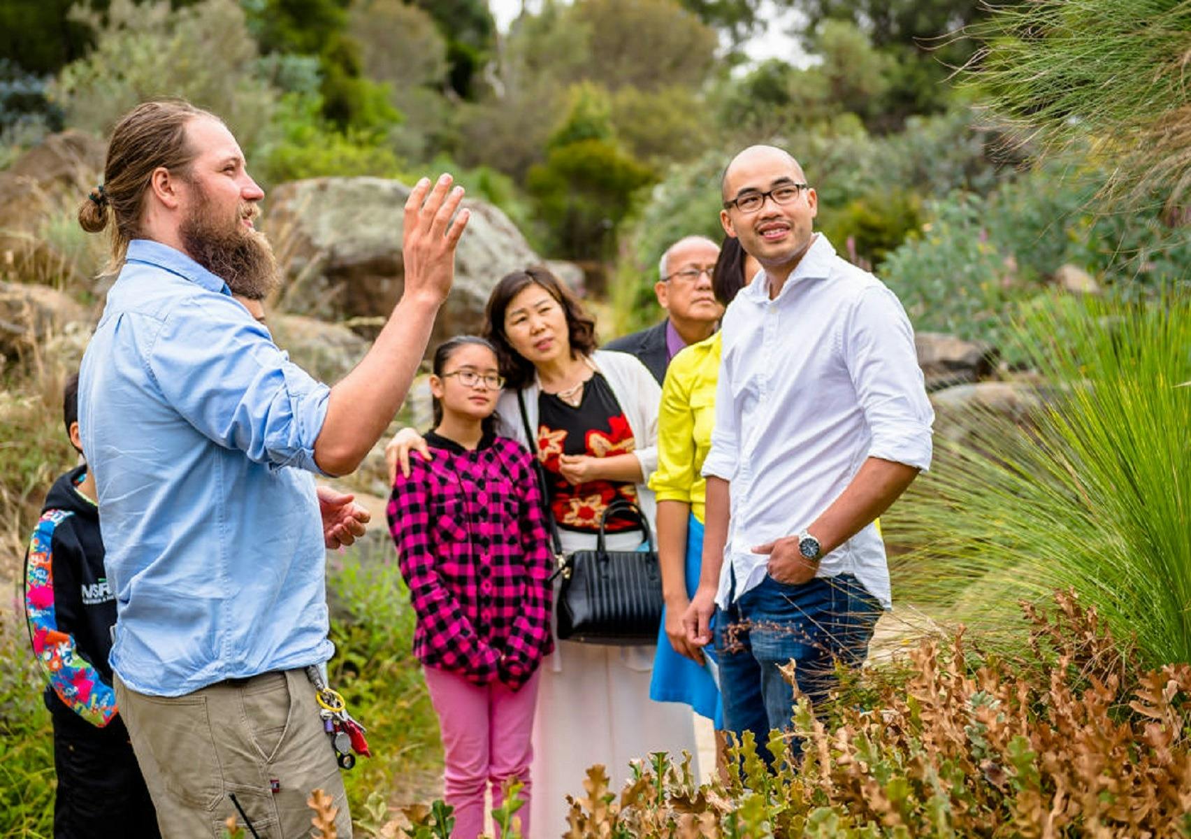 Garden's Ranger with international visitors