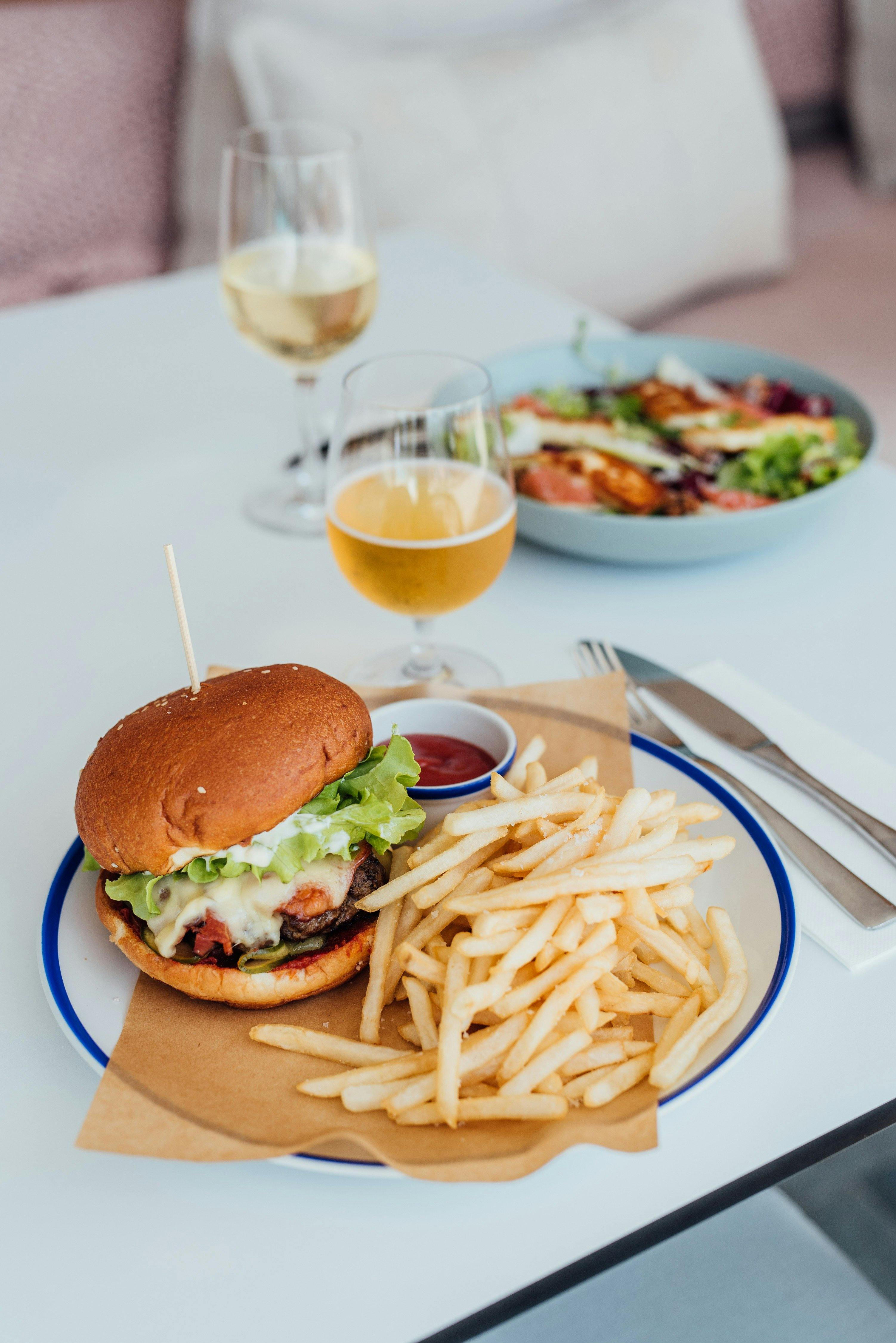 Burger with fries and beer
