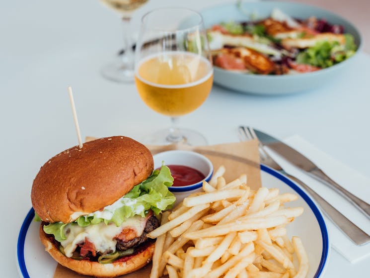 Burger with fries and beer
