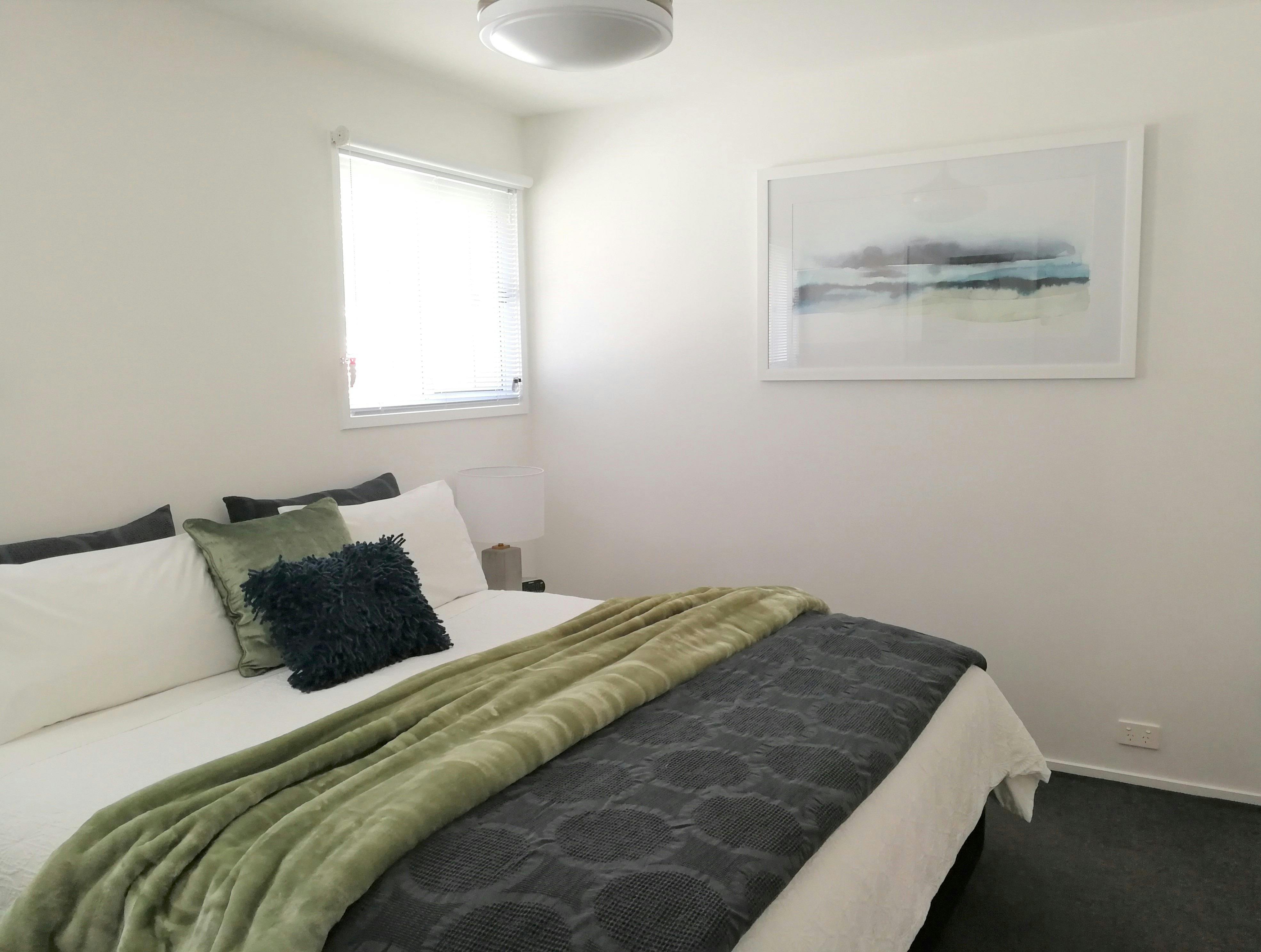 Main bedroom configuration: king bed (shown) or two single beds.