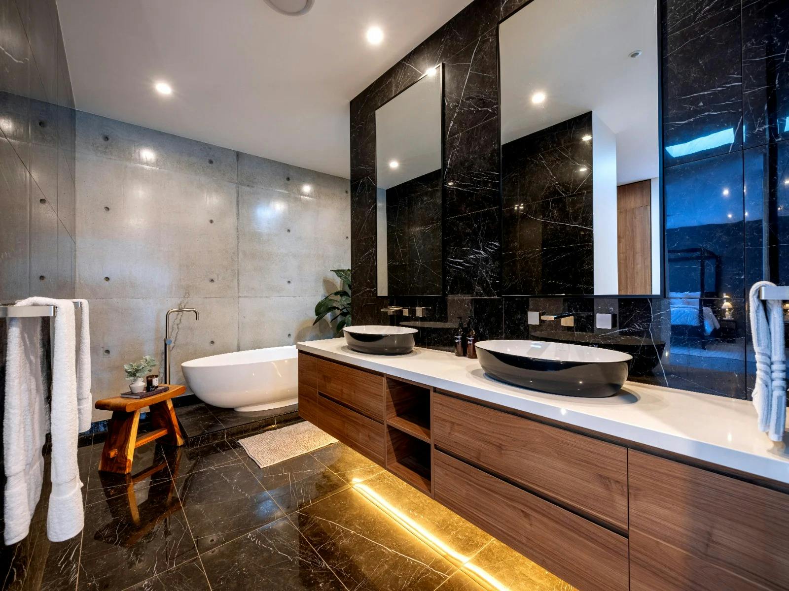 Full-sized luxe amenities by Grown Alchemist in every bathroom