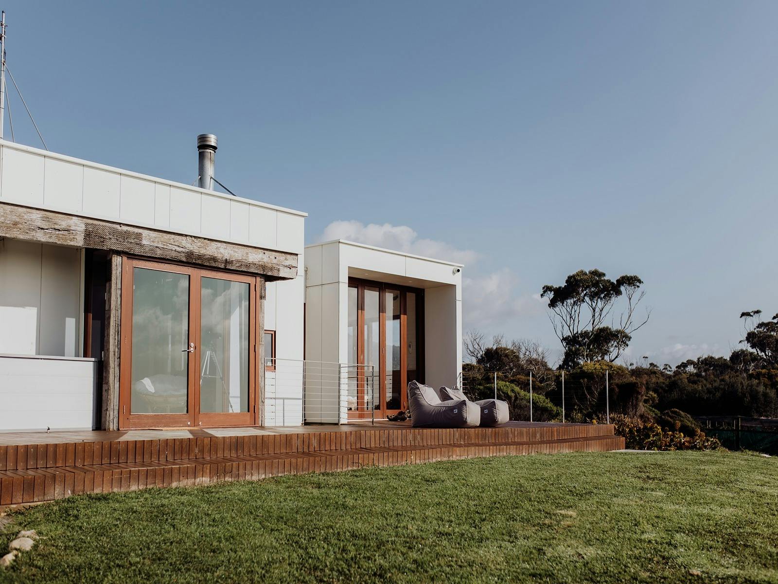 Outdoor area looking out to the ocean and beach.