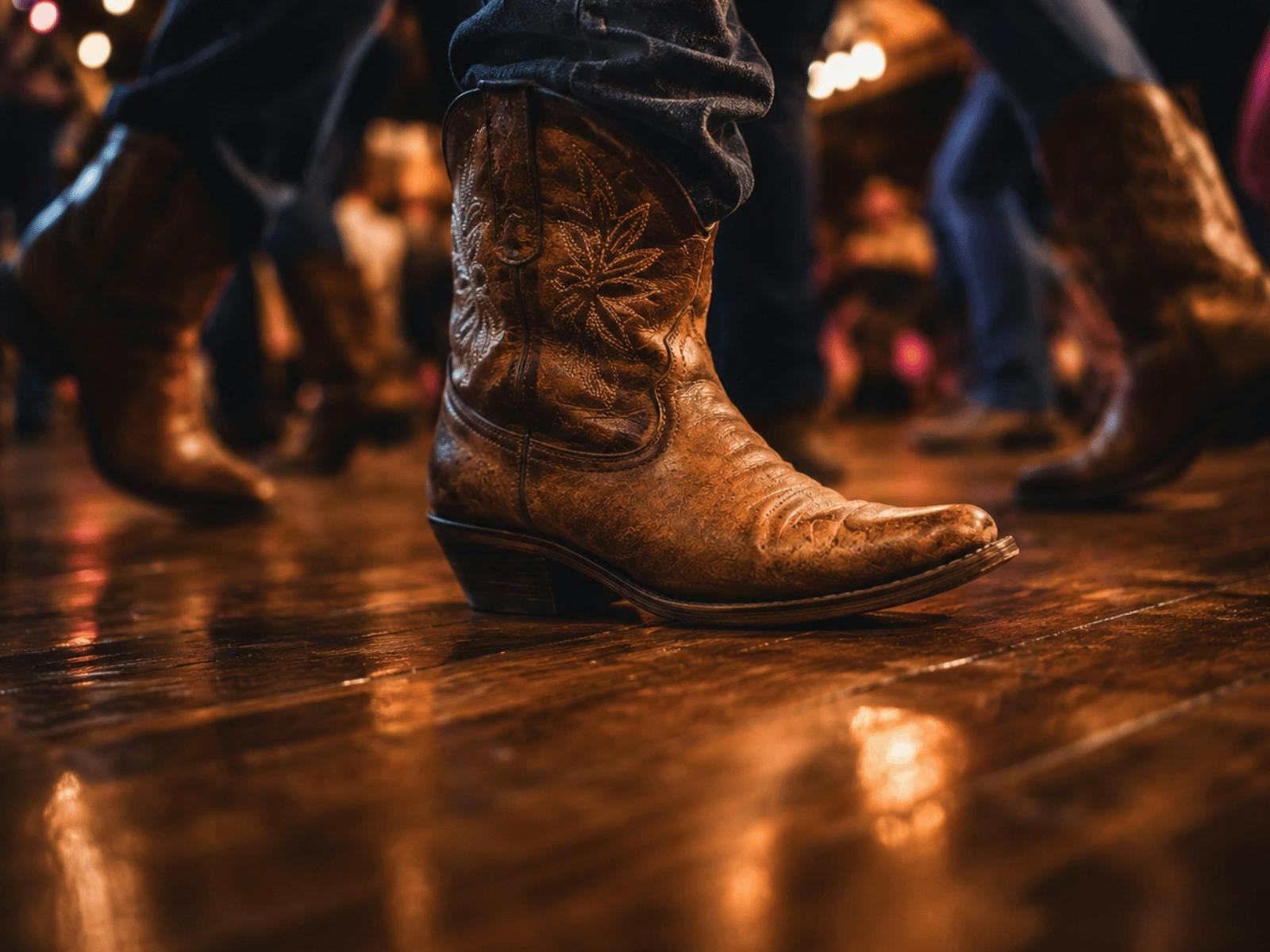 Country boots close up on a dance floor