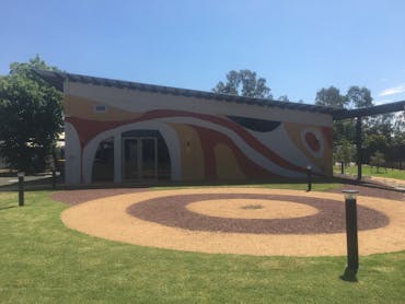 Indigenous landscaped outdoor area outside Harmony Centre
