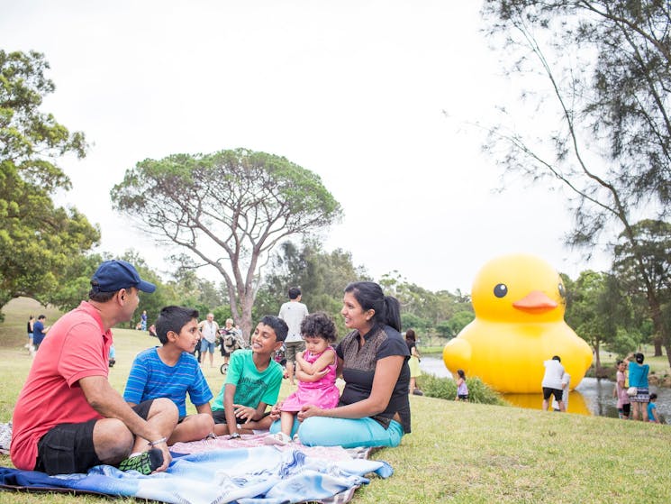 Family picnics in Parramatta Park during Sydney Festival