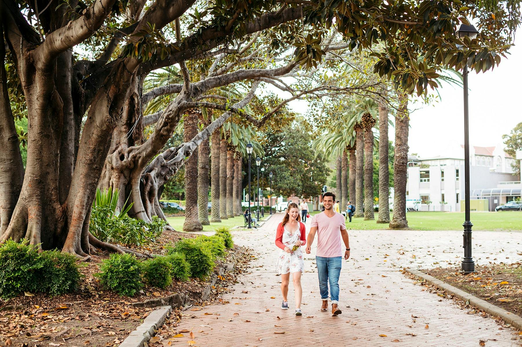 Couple enjoying a walk through Prince Alfred Square