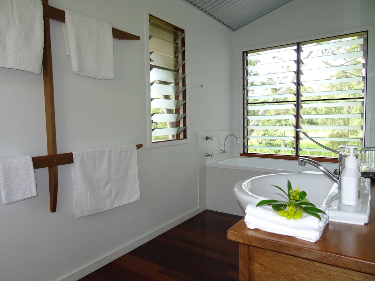 En-suite bathroom with spa bath