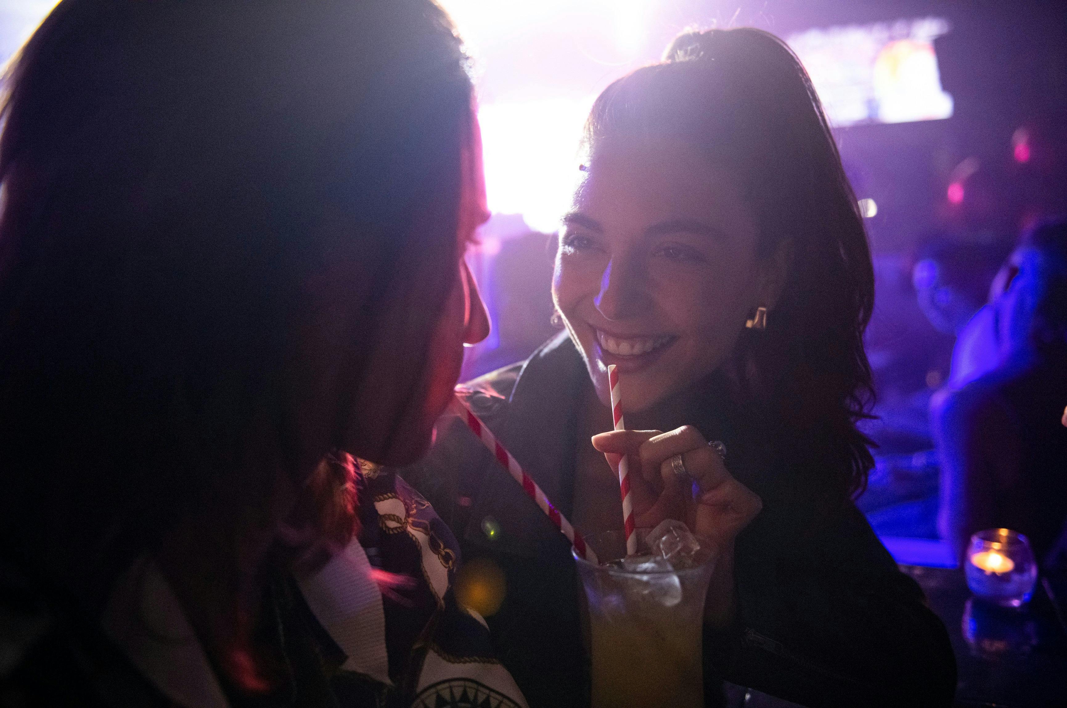 Friends enjoying drinks at Universal Sydney nightclub in Darlinghurst, Sydney